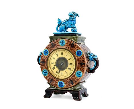 A Majolica-Cased Mantel Timepiece, circa 1870, of drum form with Dog of Fo finial and mask handles, decorated in cloisonne st