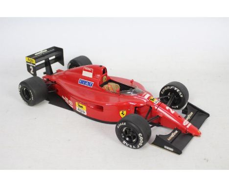 Tamiya - A built vintage 1:12 'Big Scale Series' plastic model kit # 25 by Tamiya of a Ferrari 641/2 F1 racing car. The kit w