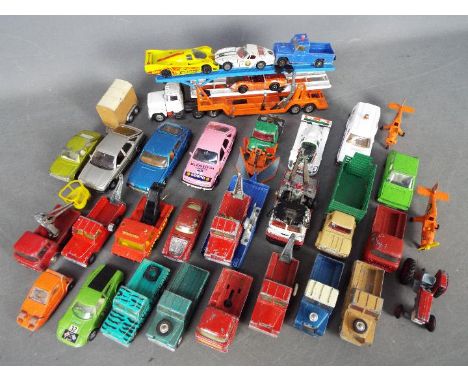 Corgi - A collection of 34 x loose vehicles in 1:43 and 1:36 scale including # 1146 tri-deck car transporter, # 389 Bond Bug,