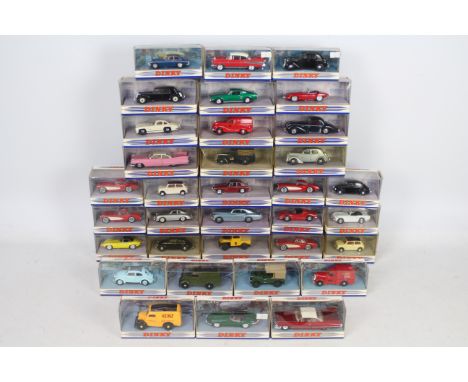 Dinky - Matchbox - 34 boxed models in 1:43 scale including 1967 Ford Mustang Fastback # DY-16, 1973 MGB GT V8 # DY-19, 1949 L