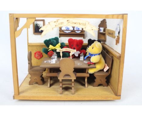 Hermann Teddy Original - A limited edition wooden 'Zum Barenwirt' cafe set depicting four small Hermann mohair bears playing 