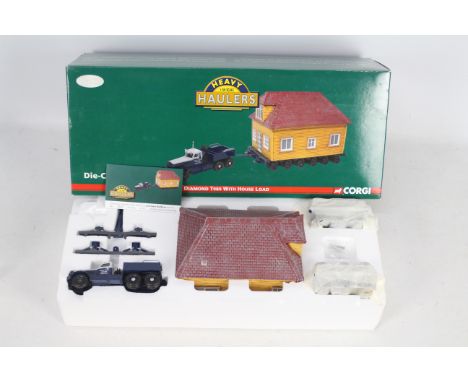 Corgi - Heavy Haulers - A limited edition 1::50 scale Diamond T989 with House load # US55109. This is set number 591 of only 