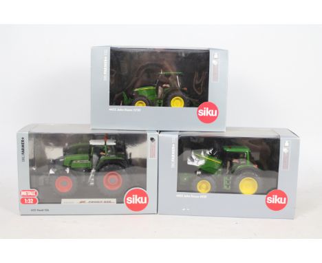 Siku - Three boxed 1:32 scale diecast model tractors from Siku. Lot consists of #4452 John Deere 5720; #4455 John Deere 6920;