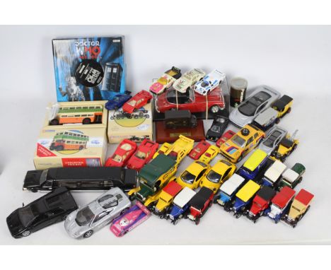 Corgi - Bburago - Ertl - Lledo - 40 plus mostly unboxed car, van and bus models including Austin Healey 3000 in 1:18 scale, a