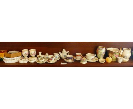 Shelf of small china ornaments