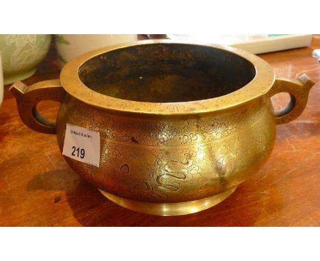 Chinese bronze censer with two handles and character marks to base, 18cm diameter x 9cm high
