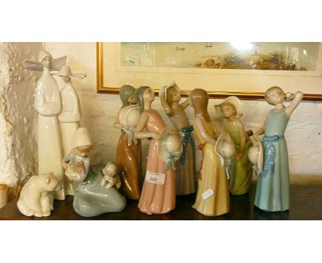Lladro polar bear and two other figurines and a set of six Lladro figurines of china girls with hats