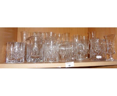 Cut glass whisky tumblers, wine glasses and water jugs