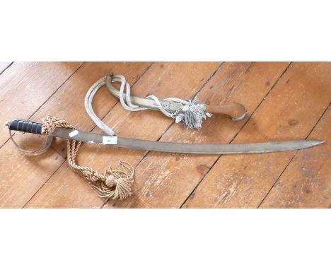 Indian souvenir cutlass and a similar Arabian dagger