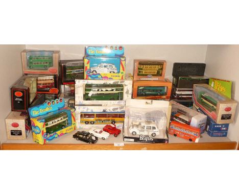 Good collection of boxed Corgi and other diecast coaches and buses including; 3 "Beatles" buses and 2 "Beatles" taxi cabs