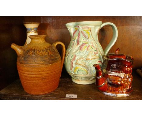 Large Beswick ware jug, a Toby teapot, a Studio pottery pitcher and a Japanese crackleware vase