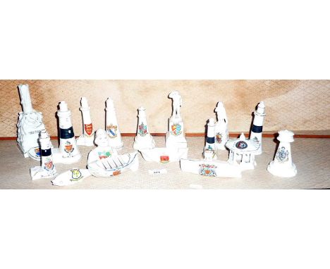 Shelf of Crested China including Arcadian submarine for Hereford and eight lighthouses, lifeboatmen, etc (17)