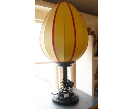 Large table lamp with a turned base and a 'hot air balloon' shade