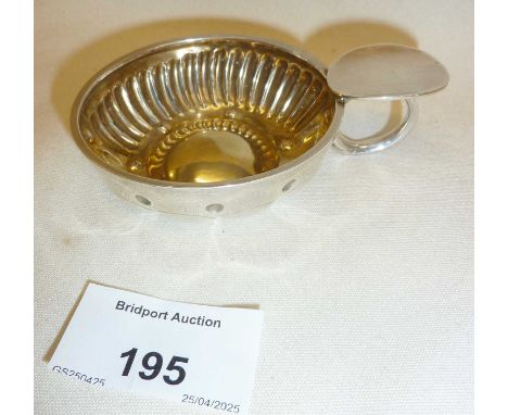 Antique French silver tastevin with gilt bowl. Minerva 950 hallmark, and a makers mark.Approx. 9.5cm diameter and 41g