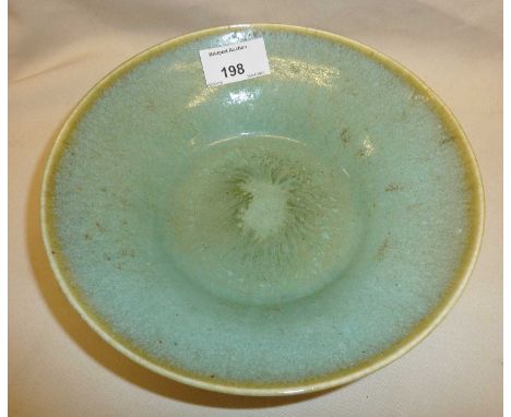 Arts & Crafts Ruskin Pottery low green footed bowl. Impressed marks include "Ruskin"Approx. 19.8cm rim diameter and 6cm high