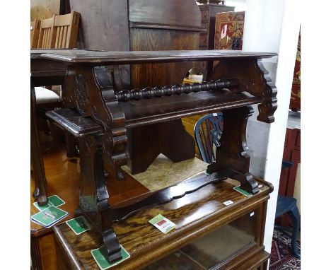 An unusual oak 2-section stool and bench seat, with turned stretchers and carved decoration, overall length 82cm 