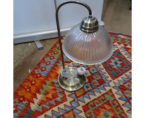 A brass effect desk lamp with glass shade, height 50cm 