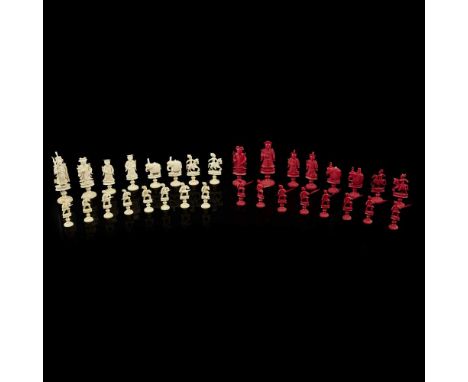 Y IVORY EXPORT CHESS SET LATE QING DYNASTY-REPUBLIC PERIOD, 19TH-20TH CENTURY carved as standing figures in formal robes, cap