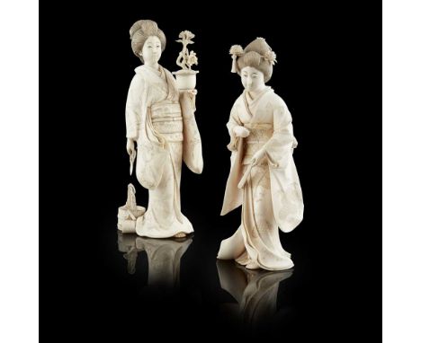 PAIR OF JAPANESE IVORY OKIMONO, MEIJI PERIODcomprising two standing ladies, one with a pot of flowers and a basket of garden 