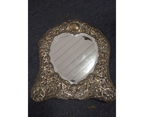 DRESSING TABLE HEARTSHAPED BEVELLED EDGE MIRROR WITH ORNATE SILVER SURROUND MARKED FOR LONDON 1901/2 ?