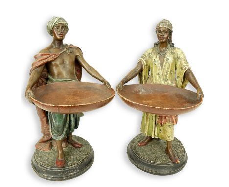 Pair of Vintage Orientalist Polychrome Pottery Male and Female Figures Holding Trays. Unsigned. Measures 15-7/8" H. Condition