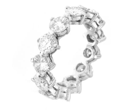 Circa 1950s 4.50 Carat TW Round Brilliant Cut Diamond and Platinum Eternity Band. Diamonds G-H color, VS2-SI2 clarity. Unsign