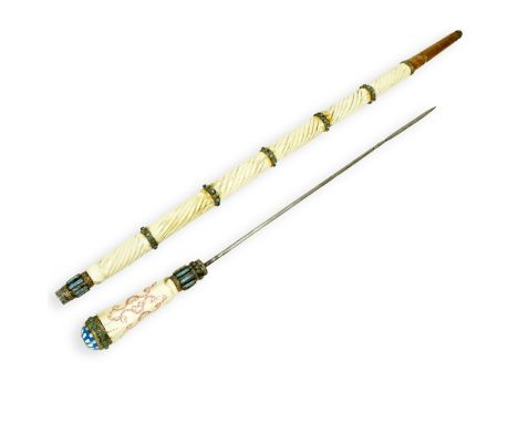 Antique Tibetan Polychrome Carved Bone Turquoise and Emerald Walking Stick with Hidden Sword Attachment. Measures 34-3/4" L. 