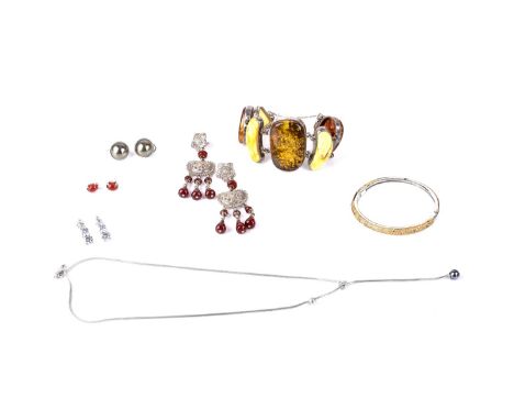 Nine (() Piece Vintage Sterling Silver Lot Including a Wide Bracelet with Faux Amber, Bangle Bracelet with CZ, Four Pair of E