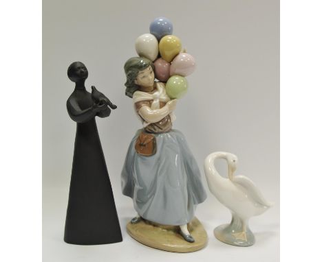 A Lladro figure of a balloon girl, pattern number 5141; Lladro goose; a Royal Doulton figure 'Peace' HN2433 (3) 