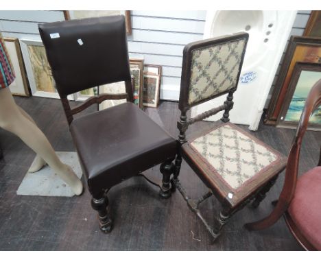 An early 20th century oak carolean style chair having later leather effect upholstery and a similar period chair with tapestr