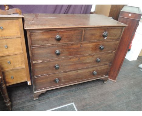 A 19th century mahogany chest of two short and three long cockbeaded drawers on bracket feet