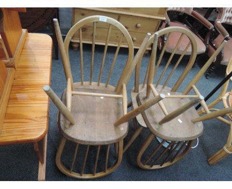 A set of four beech and elm Ercol design hoop and stick back chairs