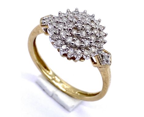 A 9ct gold diamond cluster ring, size M