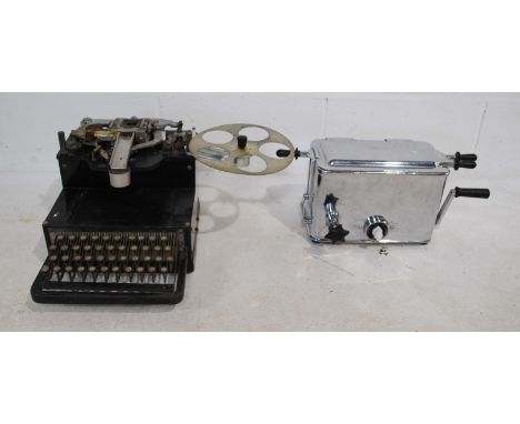 An antique Teletype machine, along with a vintage sterilizer marked 'G. U. Sterilizers Ltd, London'