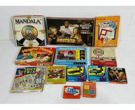 A collection of various vintage games including Spear's Action Fishing Game, Mandala, Bus Stop, Master Pieces, Master Mind, C