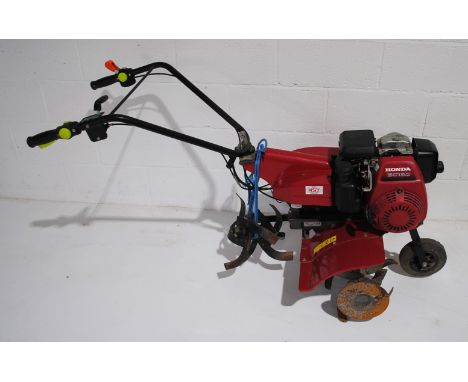 A Honda rotavator  model GC160 with extra set of wider blades