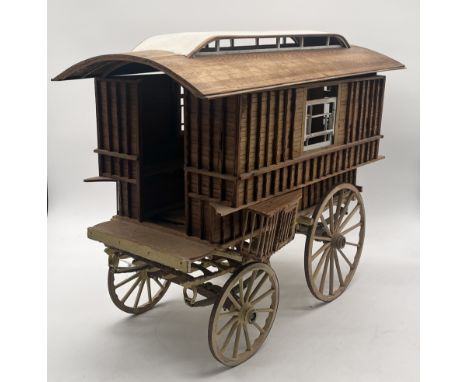 A vintage scratch-built model of a gypsy caravan with plans etc