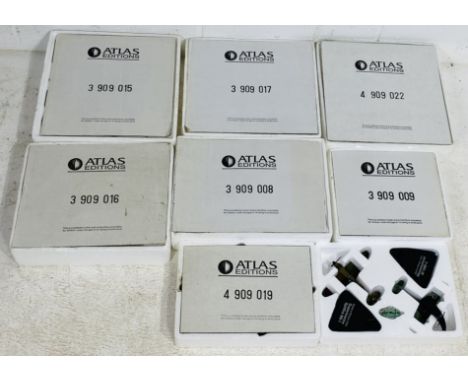 A collection of eight Atlas Editions die-cast fighter plane models including a Dornier Do 355 Pfeil/Supermarine Spitfire Mk I