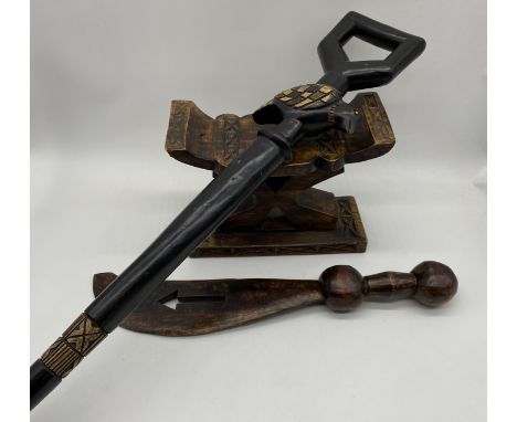 A Ghanaian tribal headrest/pillow along with a ceremonial style dagger and walking stick