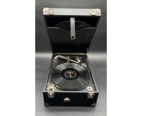 A vintage gramophone, carry handle in need of attention