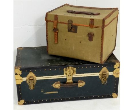A vintage blue packing trunk and a leather and canvas trunk, straps A/F.