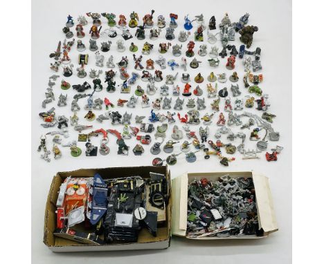 A collection of vintage Warhammer figurines, vehicles and accessories - some figures painted