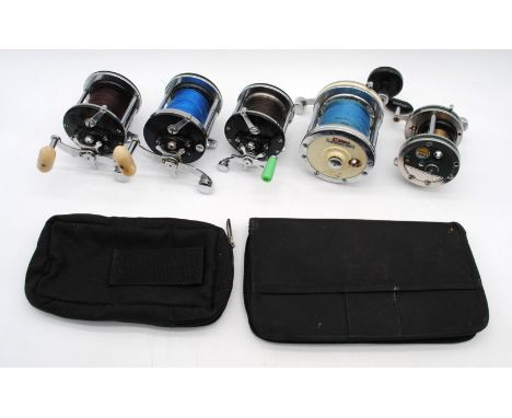 A quantity of vintage sea fishing reels, comprising a Penn 160, Penn 180, Penn 200 Surfmaster, Garcia Mitchell 624 and a Shak