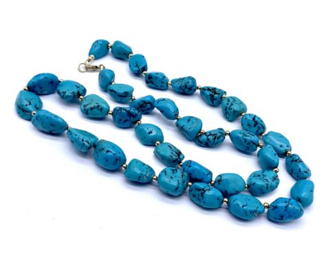 A vintage turquoise necklace with 9ct gold clasp, the stones each interspersed with gold balls
