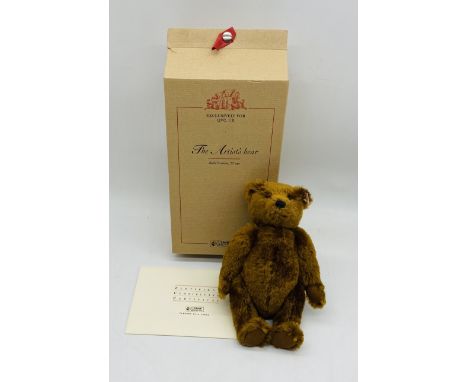 A boxed limited edition Steiff "The Artist Bear" dark brown teddy bear with certificate (No 54 of 2500) - height 27cm, exclus