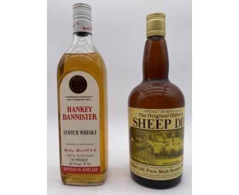 A bottle of Hankey Bannister Scotch whisky along with a bottle of "The original Oldbury Sheep Dip whisky"