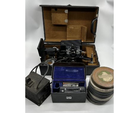 A cased Kodak Kodascope Model G series II projector along with a Kodak transformer, a number of film reels and a Kodak Instam