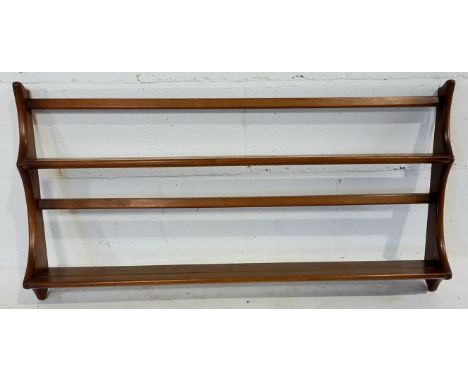 A vintage Ercol golden dawn plate rack, 97cm wide, 50cm high.