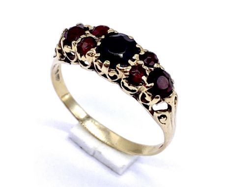 A 9ct gold Victorian style garnet 3 stone ring with garnet infills, size S