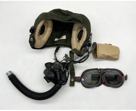 A Royal Air Force flying helmet, marked with broad arrow, K22A/512/71 size 4, complete with mask and flying googles